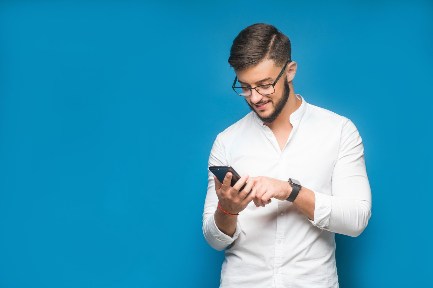 businessman-using-mobile-phone-app-texting-blue